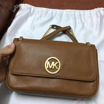 探秘时尚轻奢品牌MK包包 时尚界的传奇品牌MK包包